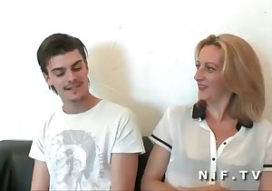 Moaning mommy riding dick on a leather couch