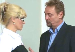 Blond-haired lady in black stockings gets sodomized