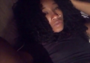 Big-bottomed ebony model stimulates her sweet wet pussy